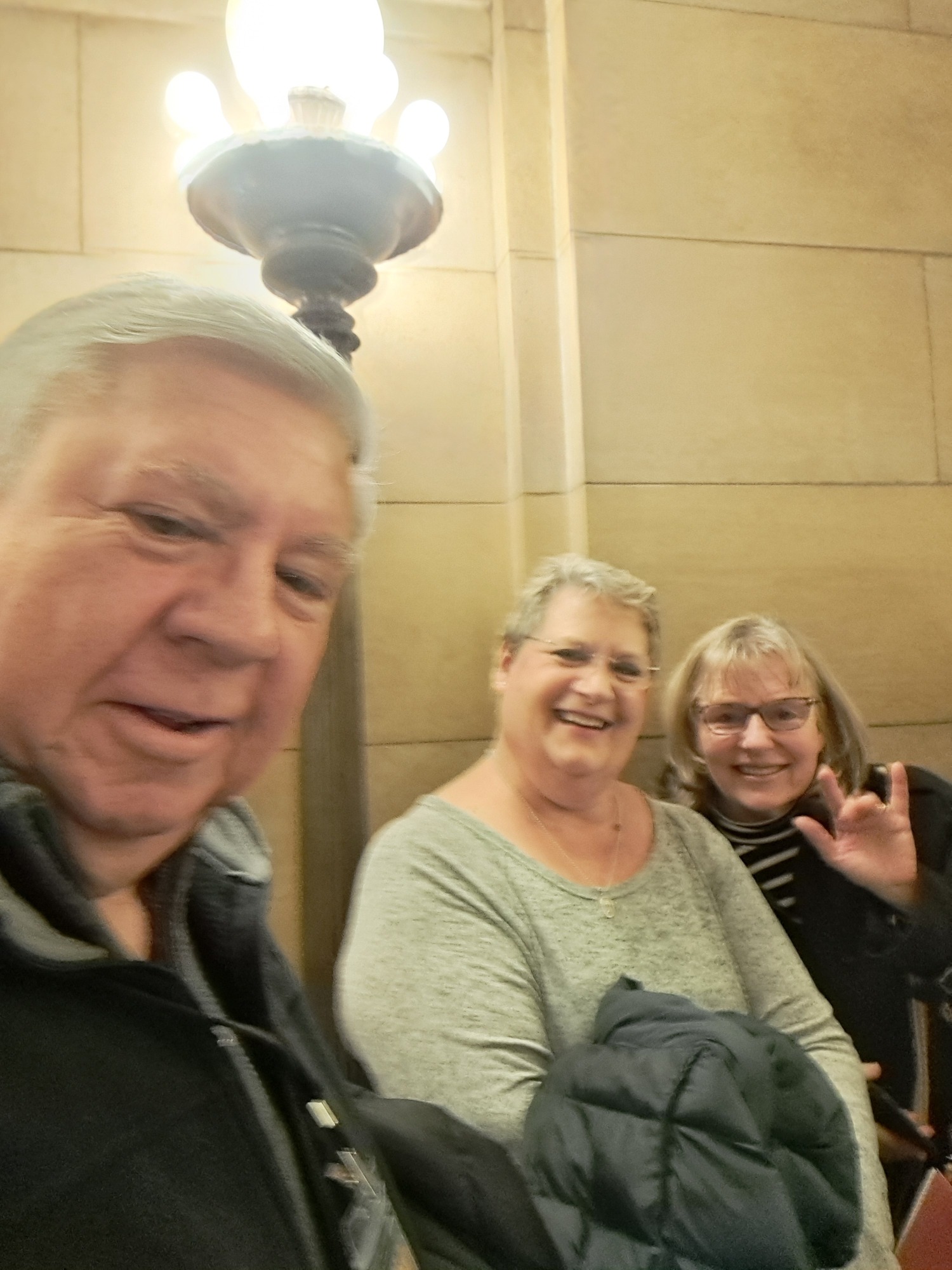 Tom Lopac with community members at the Capitol