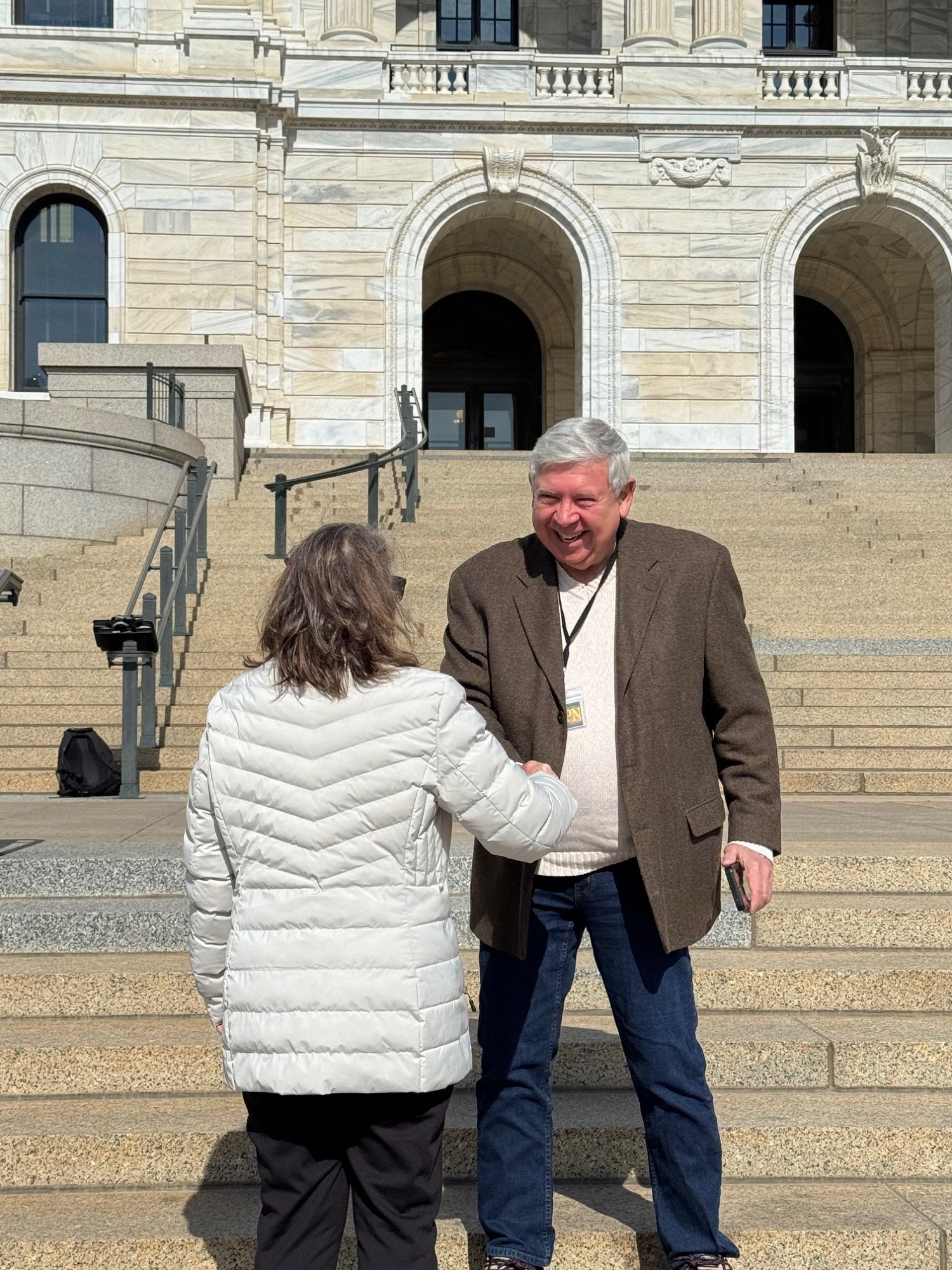 Tom Lopac leading a community meeting at the Capitol
