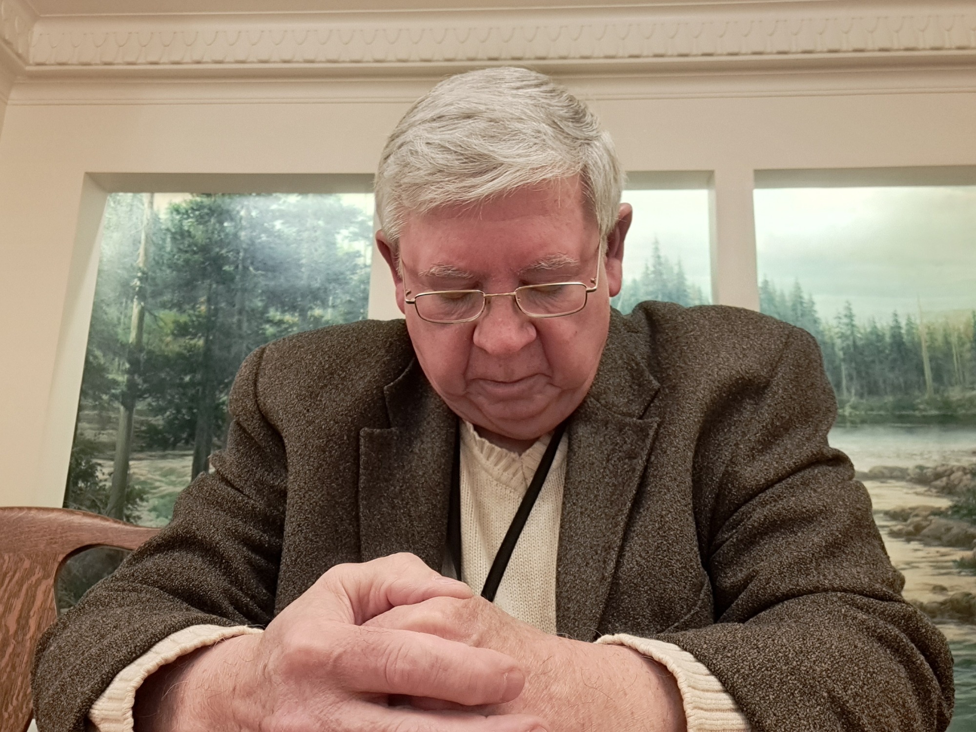 Tom Lopac in prayer at the State Capitol